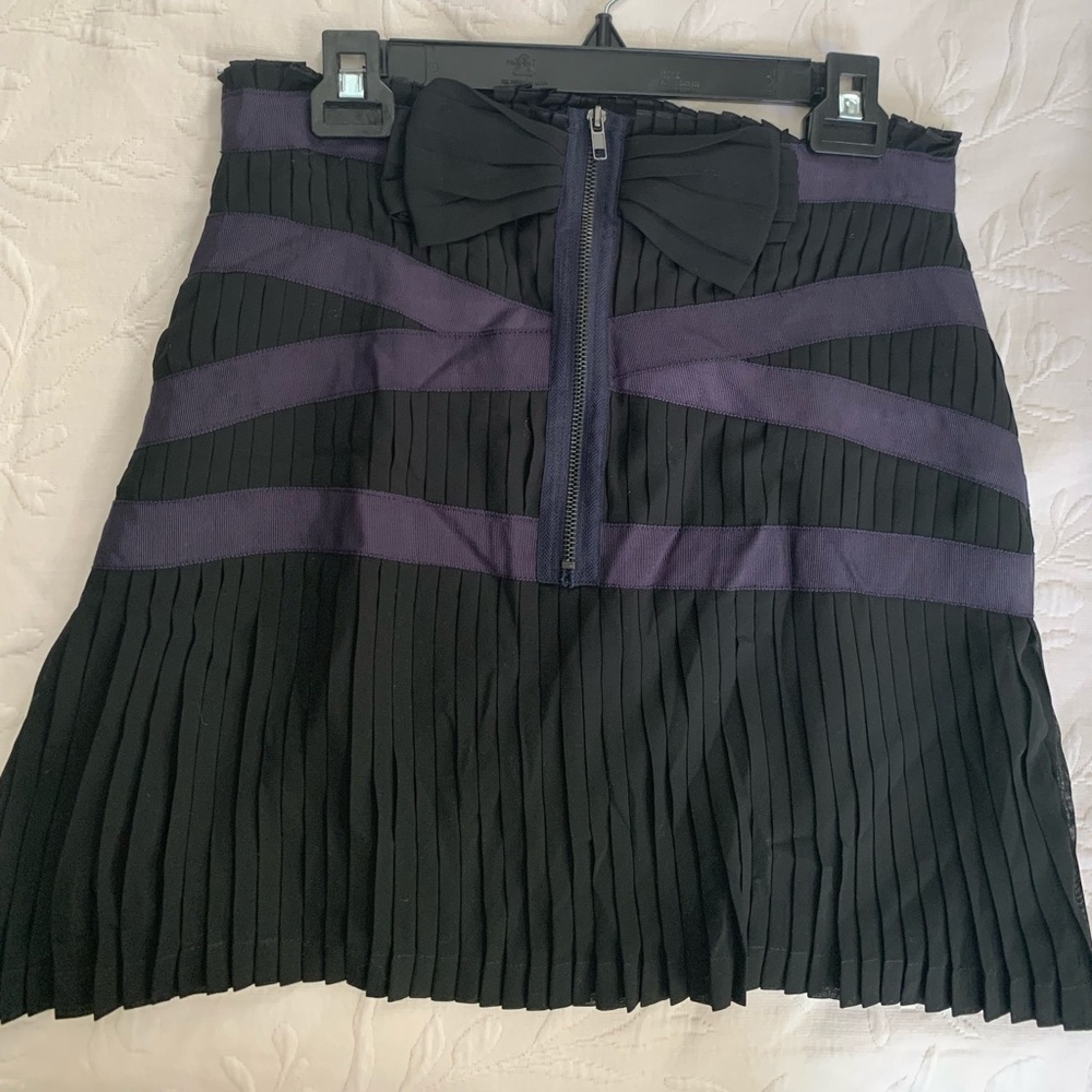Purple and black pleated mini skirt
